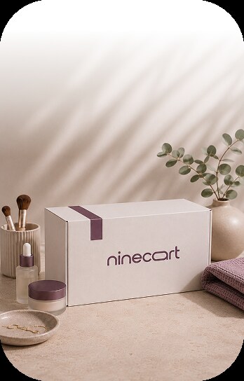 A NineCart branded box surrounded by everyday essentials
